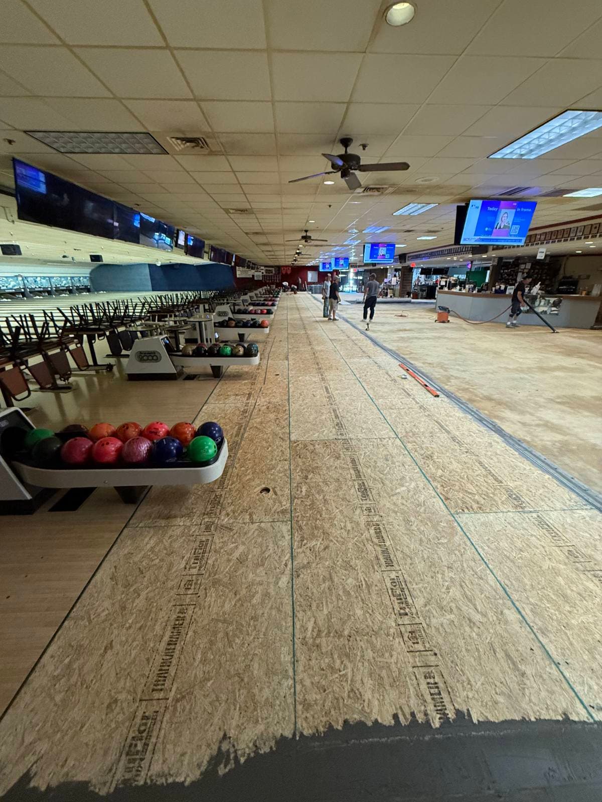 Gallery photos for Stylish LVP Flooring Transforms Bowling Venue: Image #3