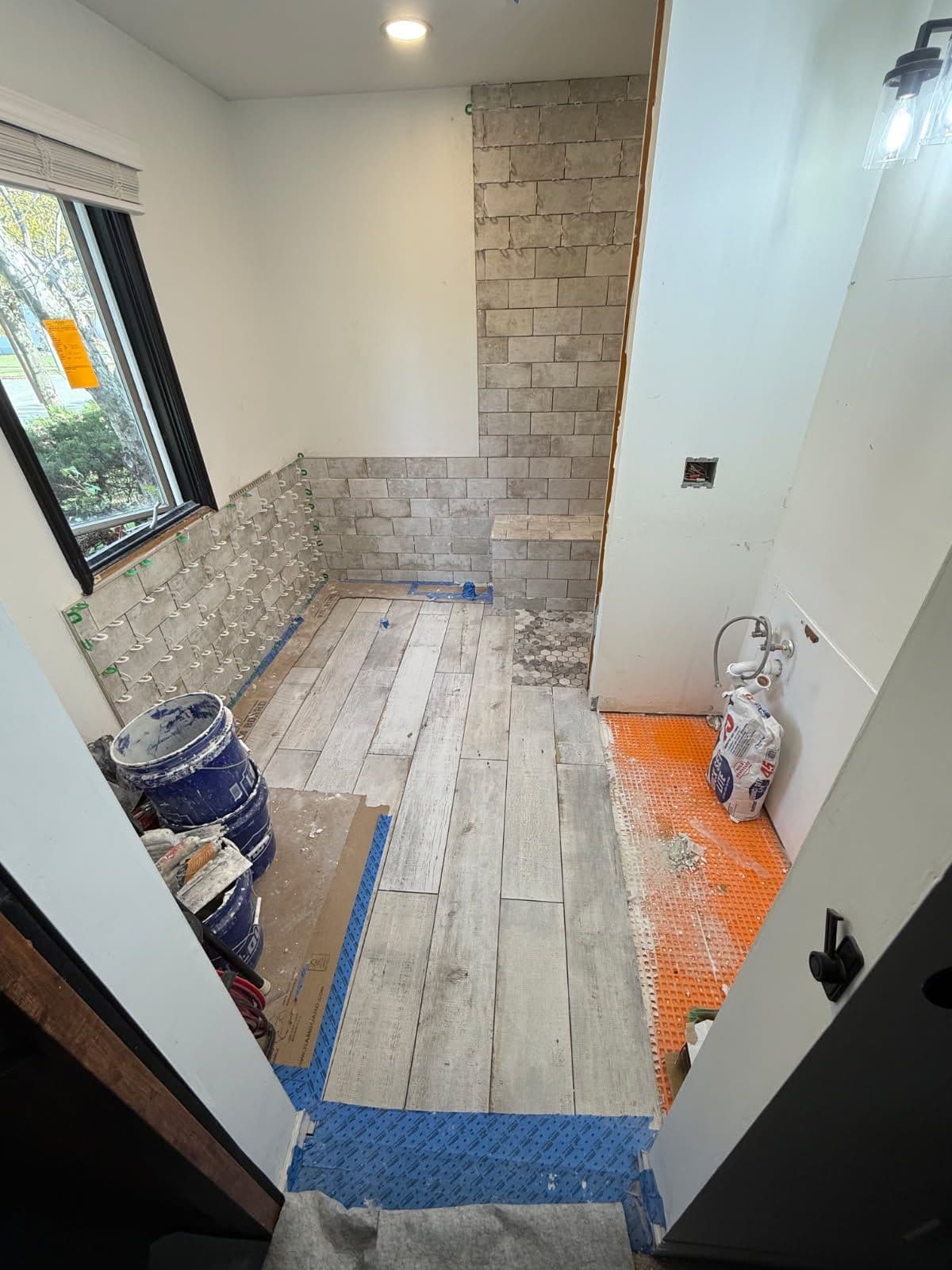 Project Bathroom Renovation with Stunning Tile Work in Saline image