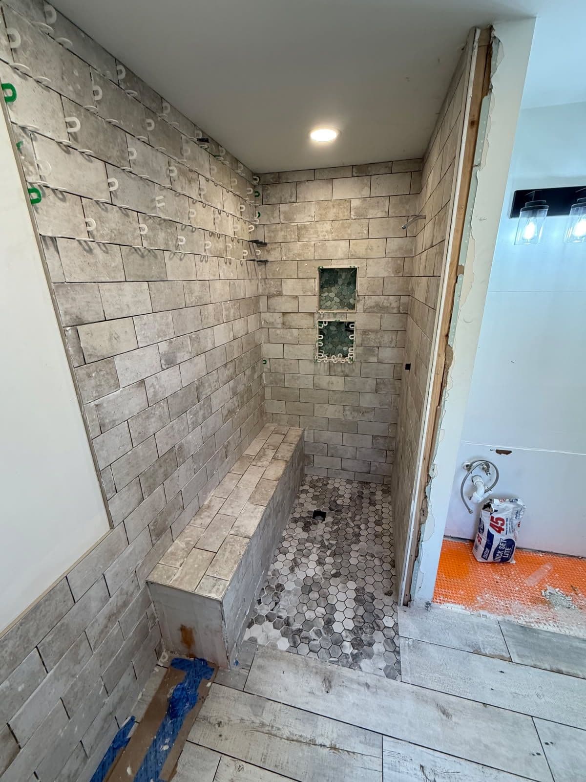 Gallery photos for Bathroom Renovation with Stunning Tile Work in Saline: Image #1